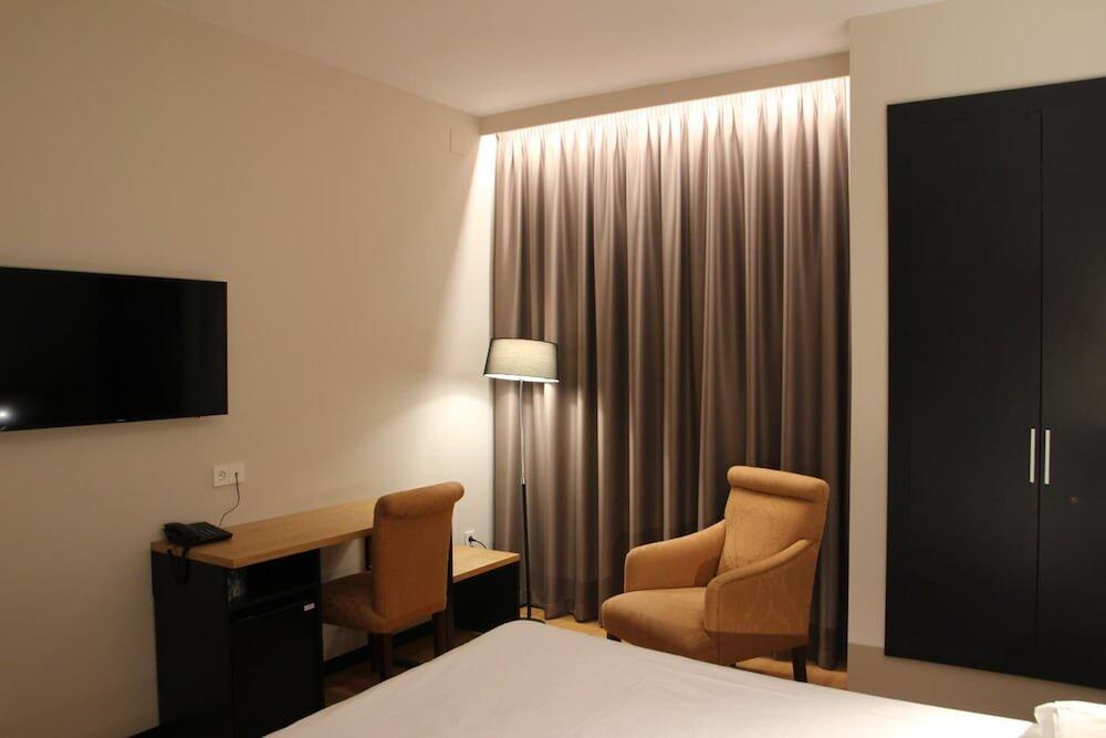 Foto de una habitación de Hotel Alcántara