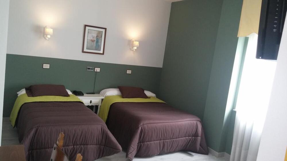 Foto de una habitación de Hotel Los Olmos