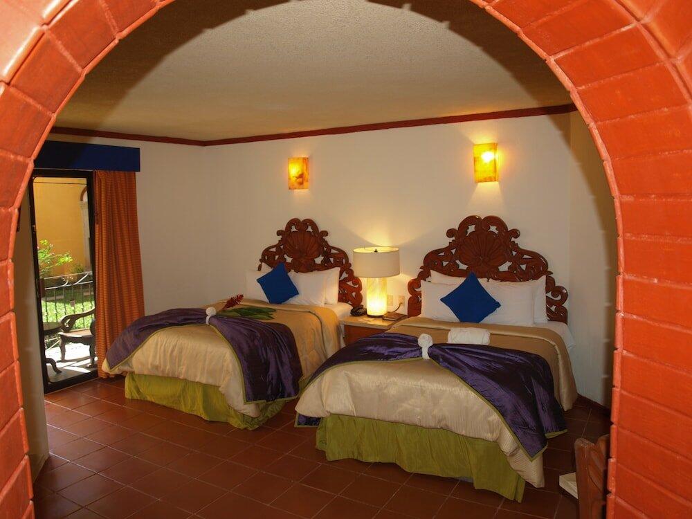 Foto de una habitación de Hotel Ecotel Quinta Regia
