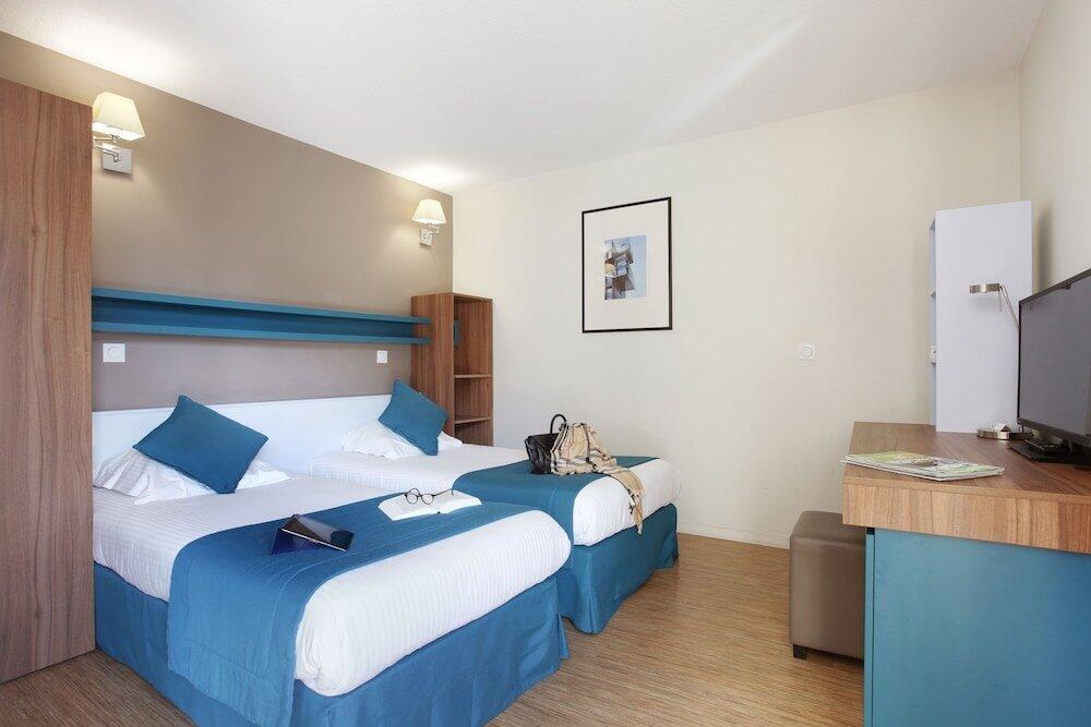 Foto de una habitación de Aparthotel Odalys City Lyon Confluence