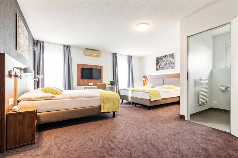Foto de una habitación de Hotel Campanile Martigny