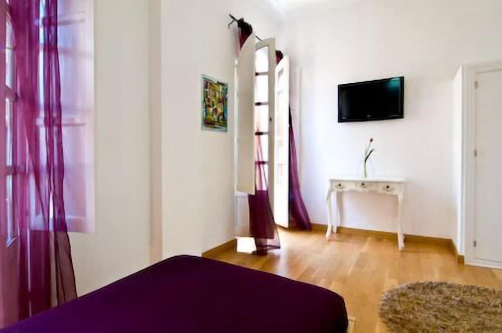 Foto de una habitación de Hotel Un Patio en Santa Cruz