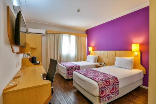 Foto de una habitación de Comfort Hotel Nova Paulista