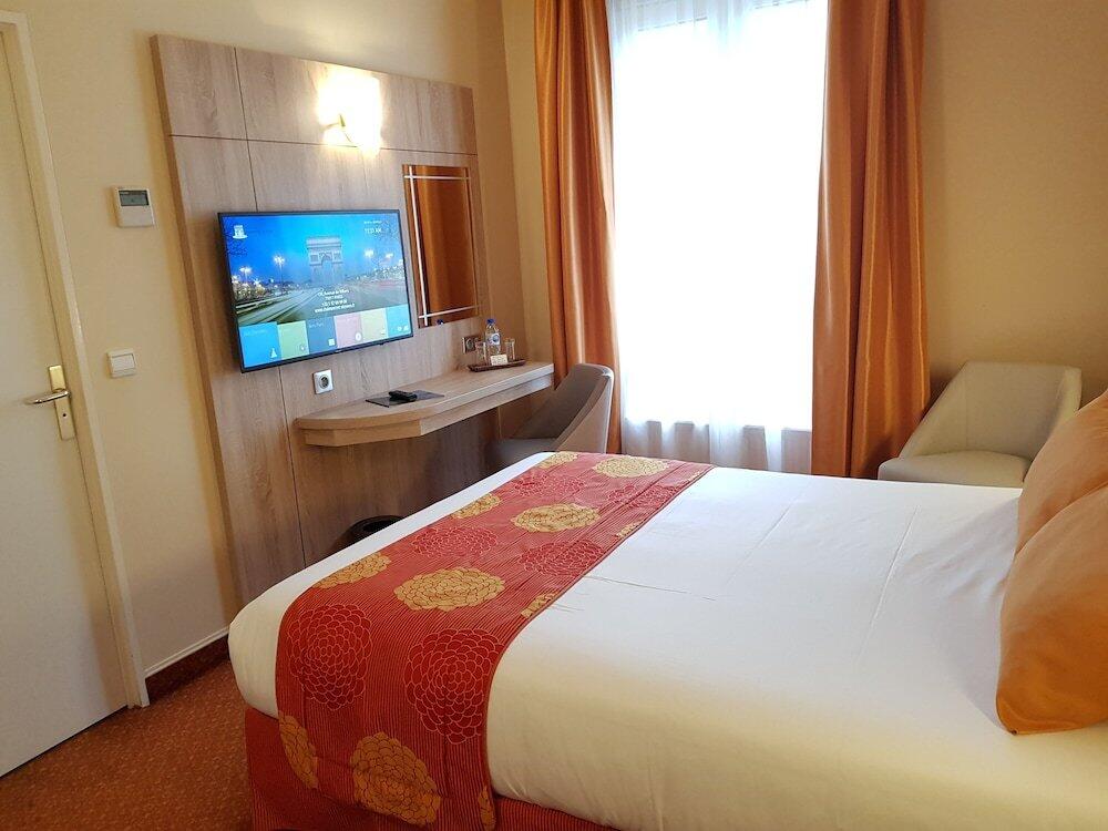 Foto de una habitación de Hotel Champerret Elysees