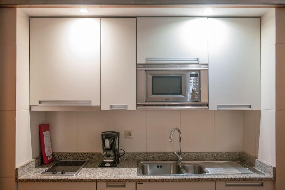 Foto de una habitación de Apartamentos Turisticos Atlantida