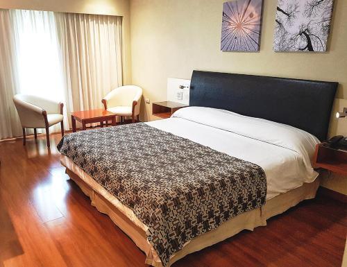 Foto de una habitación de Quorum Córdoba Hotel, Resort Urbano