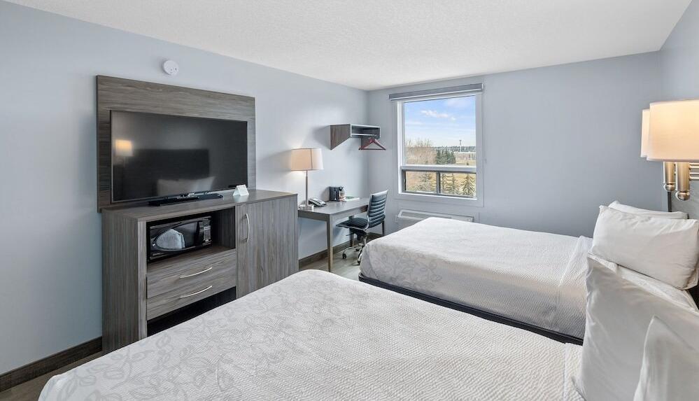 Foto de una habitación de Emerald Hotel &amp;amp; Suites