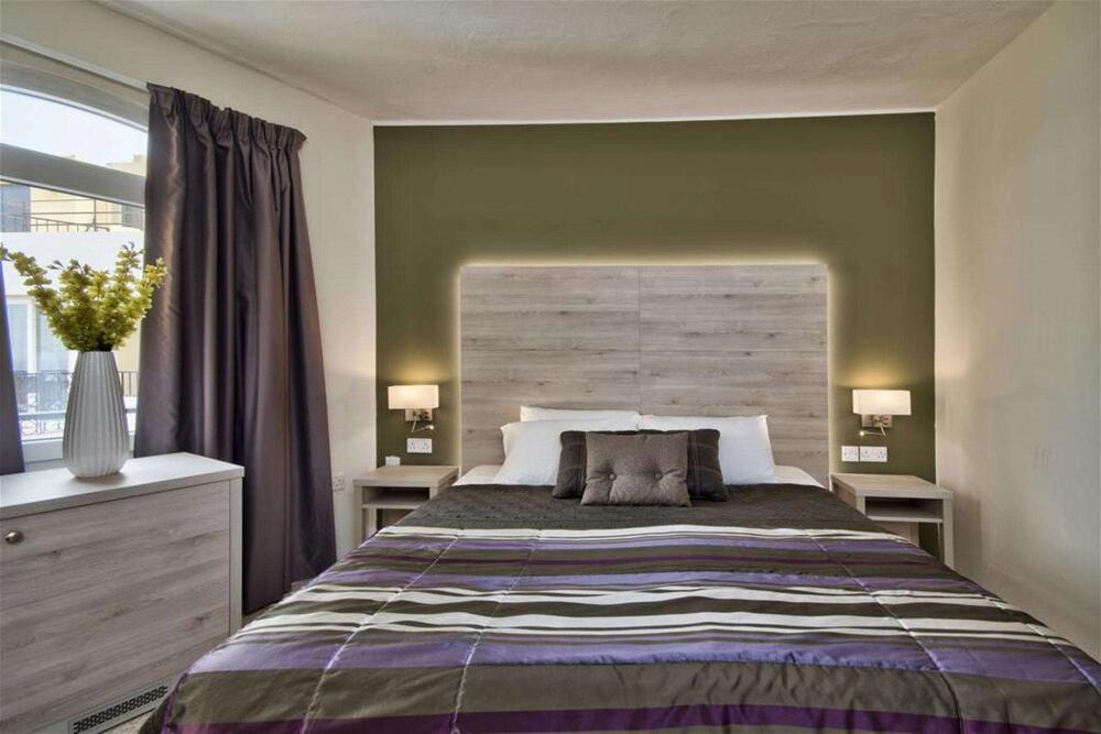 Foto de una habitación de Il Palazzin Hotel