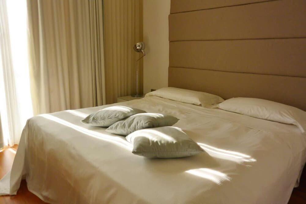 Foto de una habitación de Hotel Pisa Tower Plaza