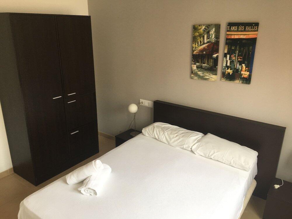 Foto de una habitación de Apartamentos Ágora La Volta