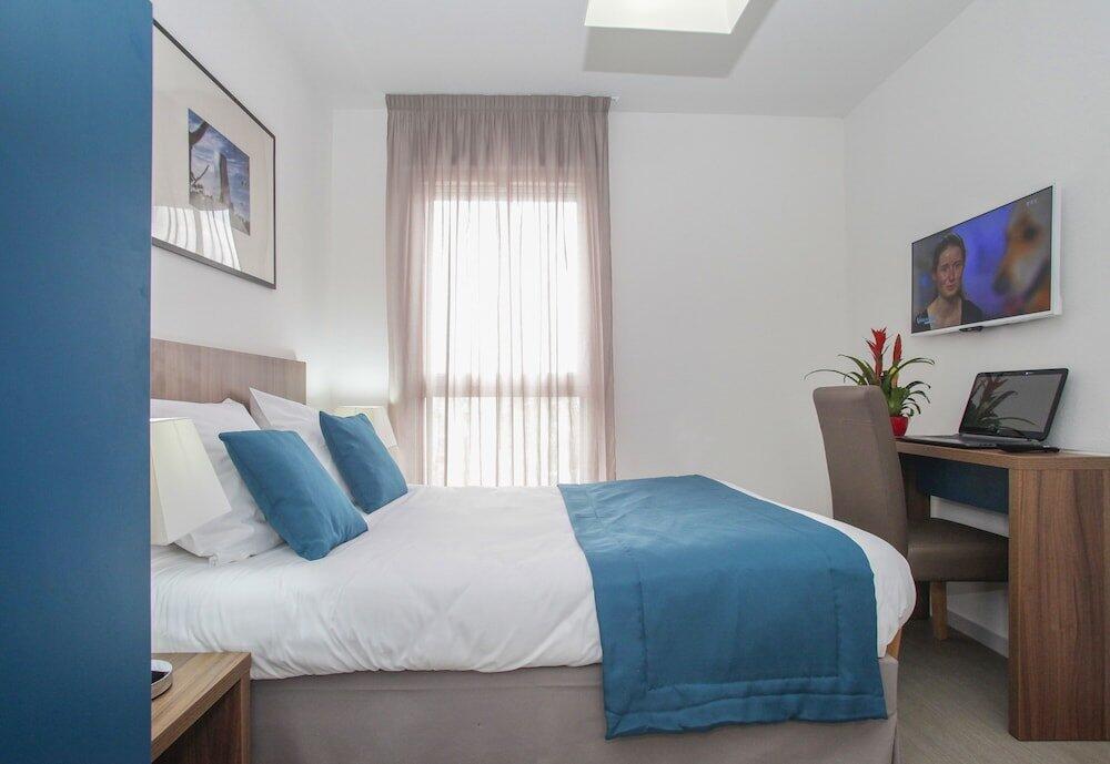 Foto de una habitación de Aparthotel Odalys City Orléans Saint Jean