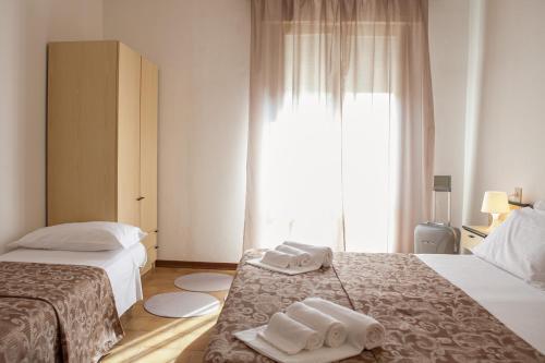 Foto de una habitación de Hotel Umberto