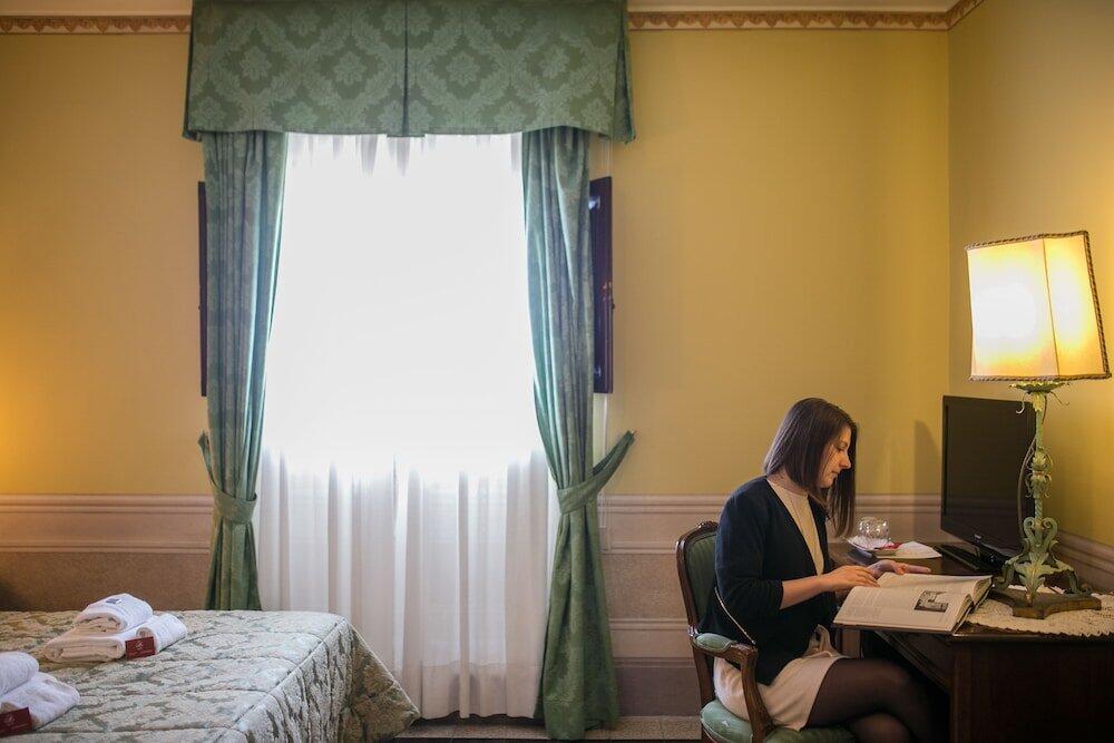 Foto de una habitación de I Portici Hotel - Residenza D&amp;#039;Epoca