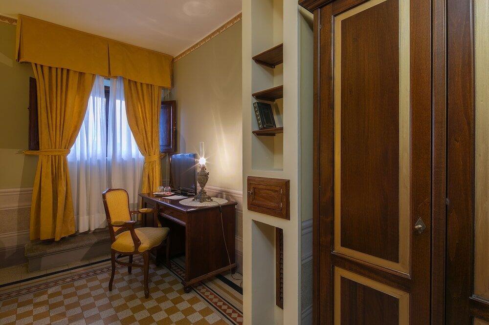 Foto de una habitación de I Portici Hotel - Residenza D&amp;#039;Epoca