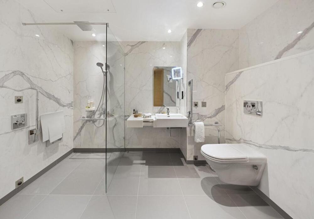 Foto del baño de Hotel Tower Suites by Blue Orchid