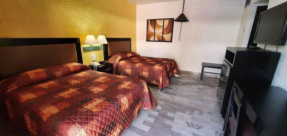 Foto de una habitación de Hotel Azteca Inn
