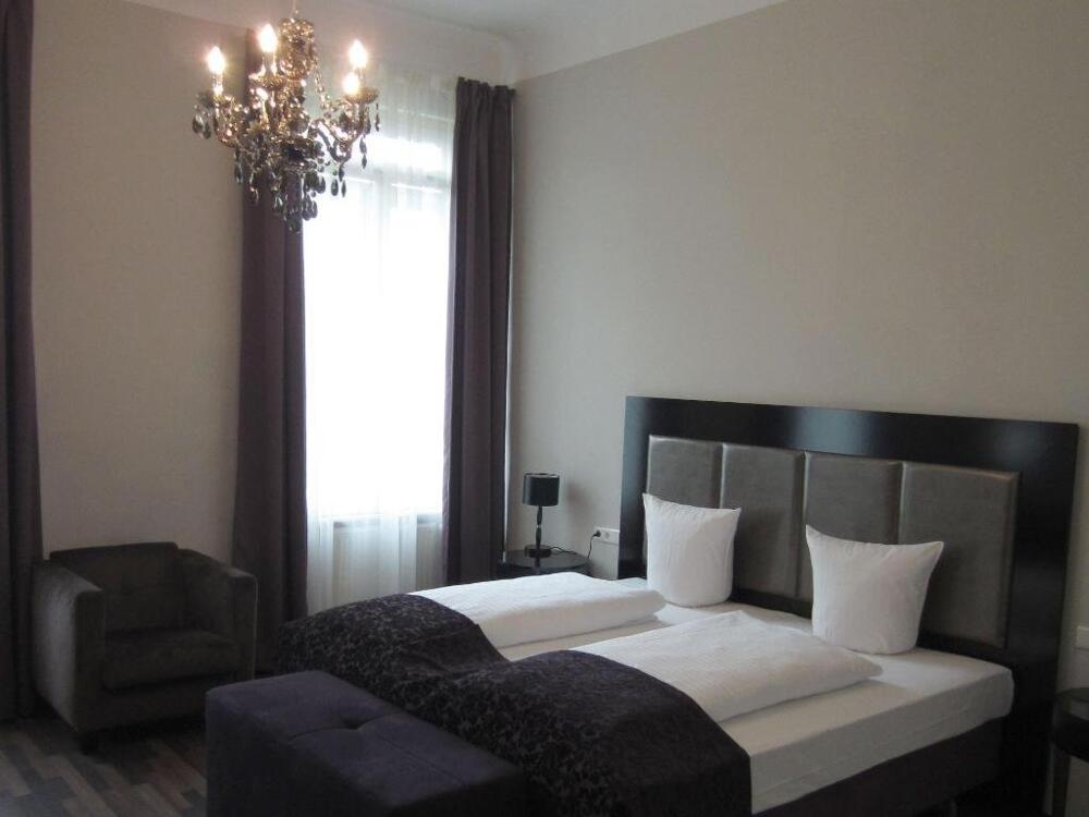 Foto de una habitación de Hotel Pension Baron am Schottentor