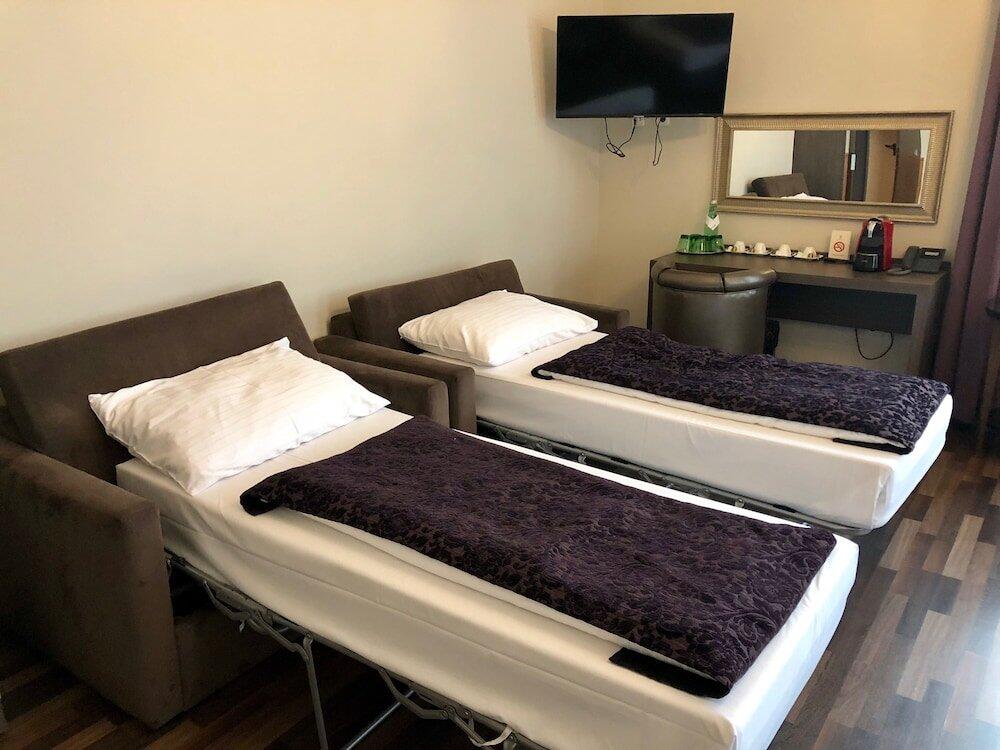Foto de una habitación de Hotel Pension Baron am Schottentor