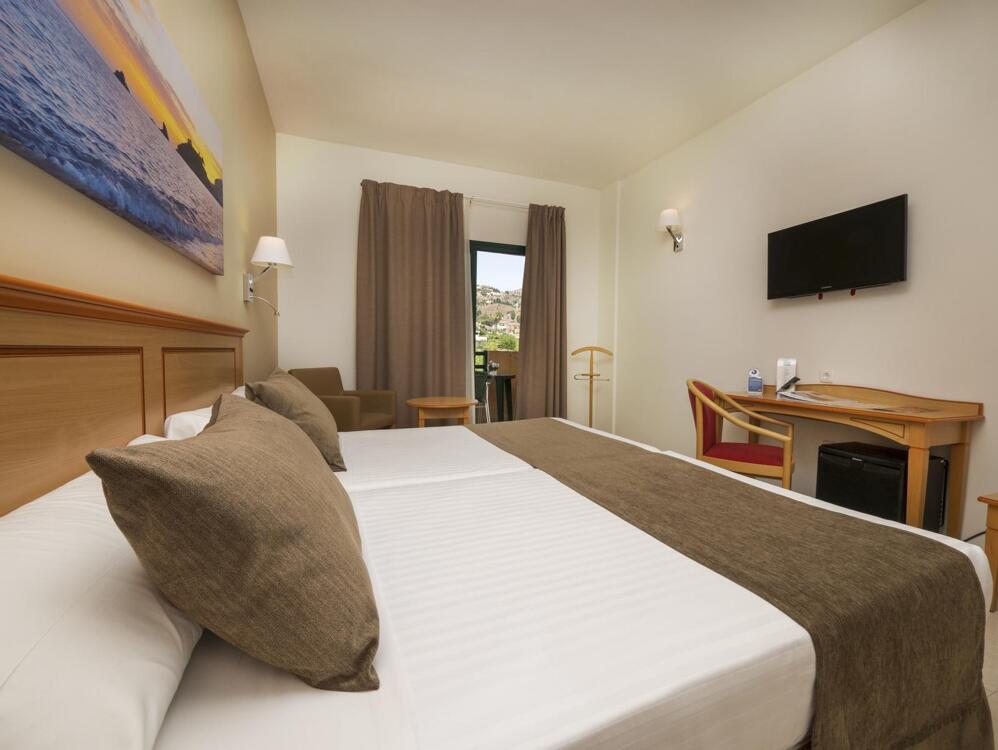 Foto de una habitación de Hotel Victoria Playa