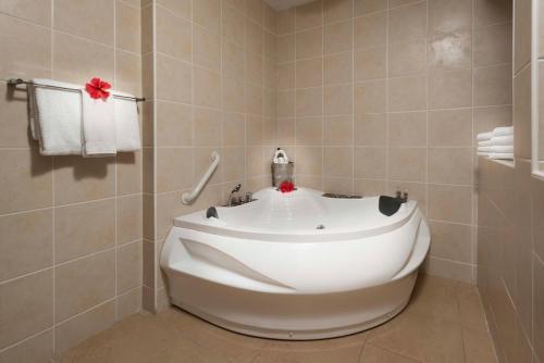 Foto del baño de Complejo Divi Little Bay Beach Resort