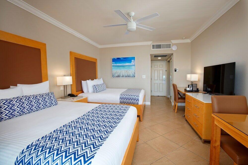 Foto de una habitación de Complejo Divi Little Bay Beach Resort