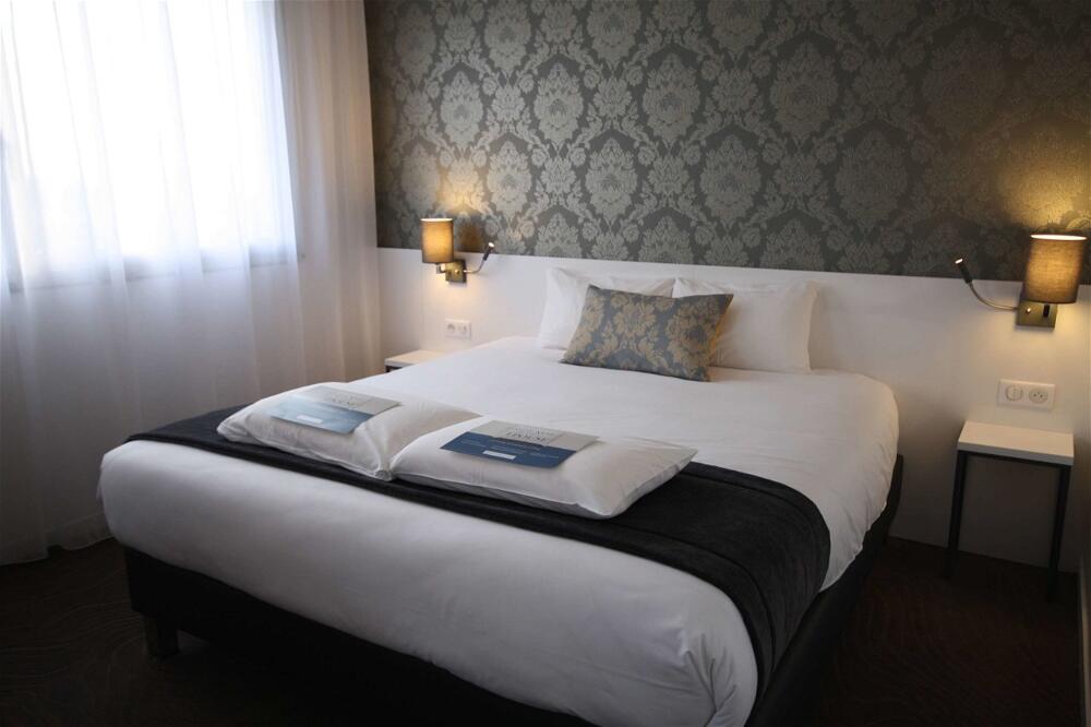 Foto de una habitación de Hotel Kyriad Tours St Pierre des Corps Gare
