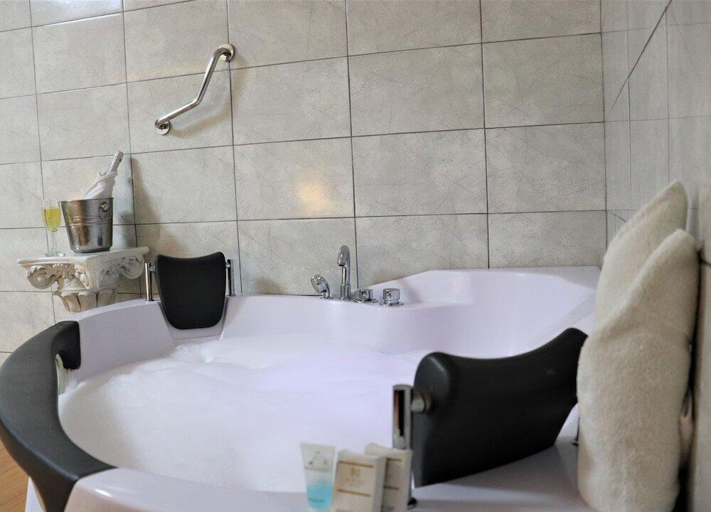 Foto del baño de Inkari Suites Hotel