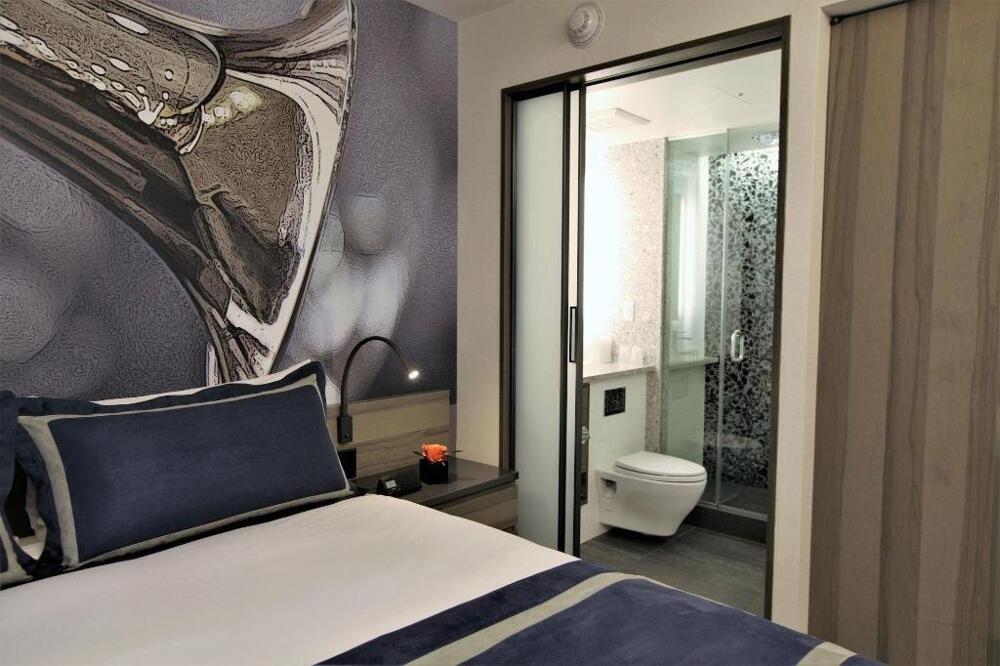 Foto de una habitación de Carnegie Hotel