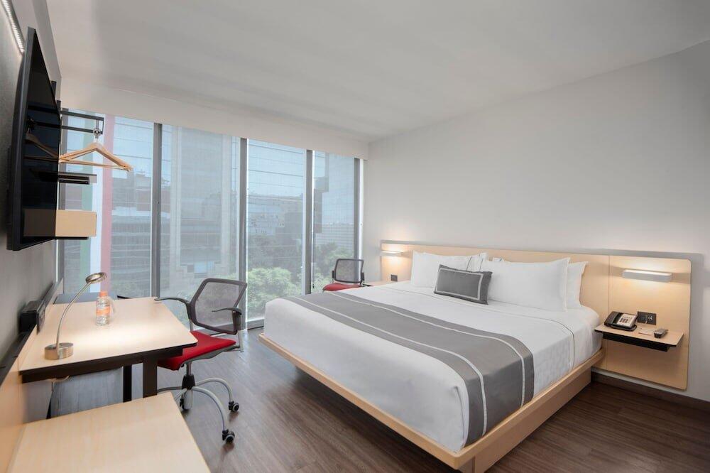Foto de una habitación de Hotel City Express Plus Insurgentes Sur