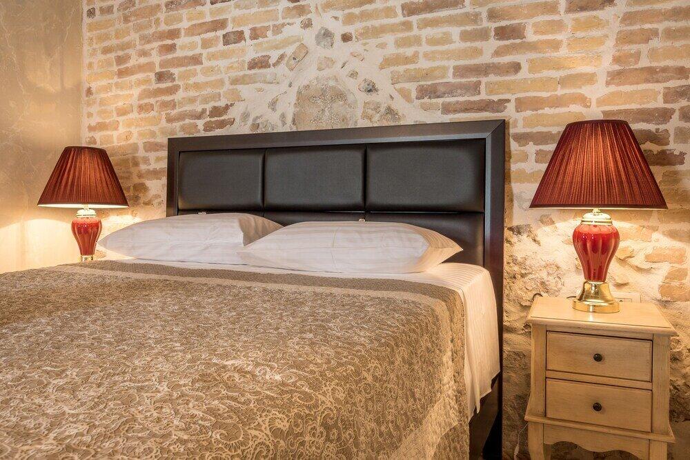 Foto de una habitación de Heritage Palace Varos - MAG Quaint &amp;amp; Elegant Boutique Hotels