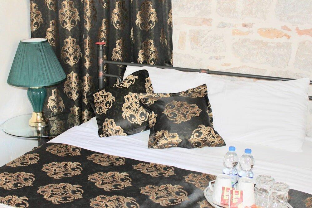 Foto de una habitación de Heritage Palace Varos - MAG Quaint &amp;amp; Elegant Boutique Hotels