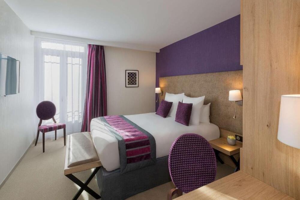 Foto de una habitación de Hôtel Le Rive Droite &amp;amp; SPA