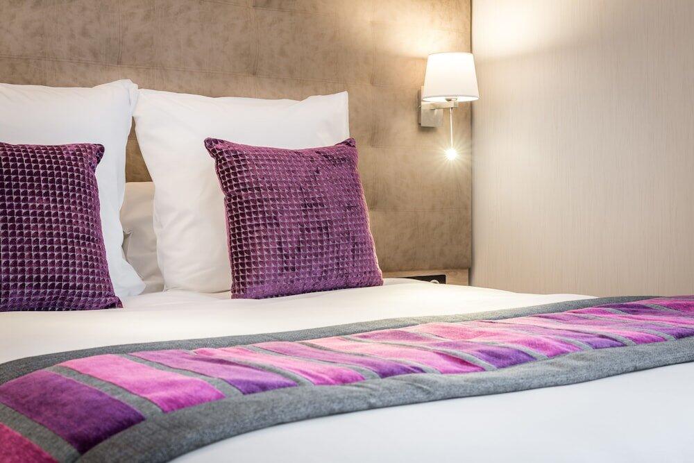 Foto de una habitación de Hôtel Le Rive Droite &amp;amp; SPA