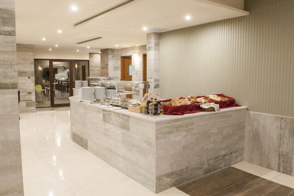 Foto de restauración de Euroclub Hotel