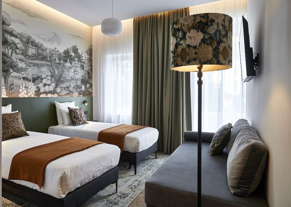 Foto de una habitación de Urban Yard Hotel