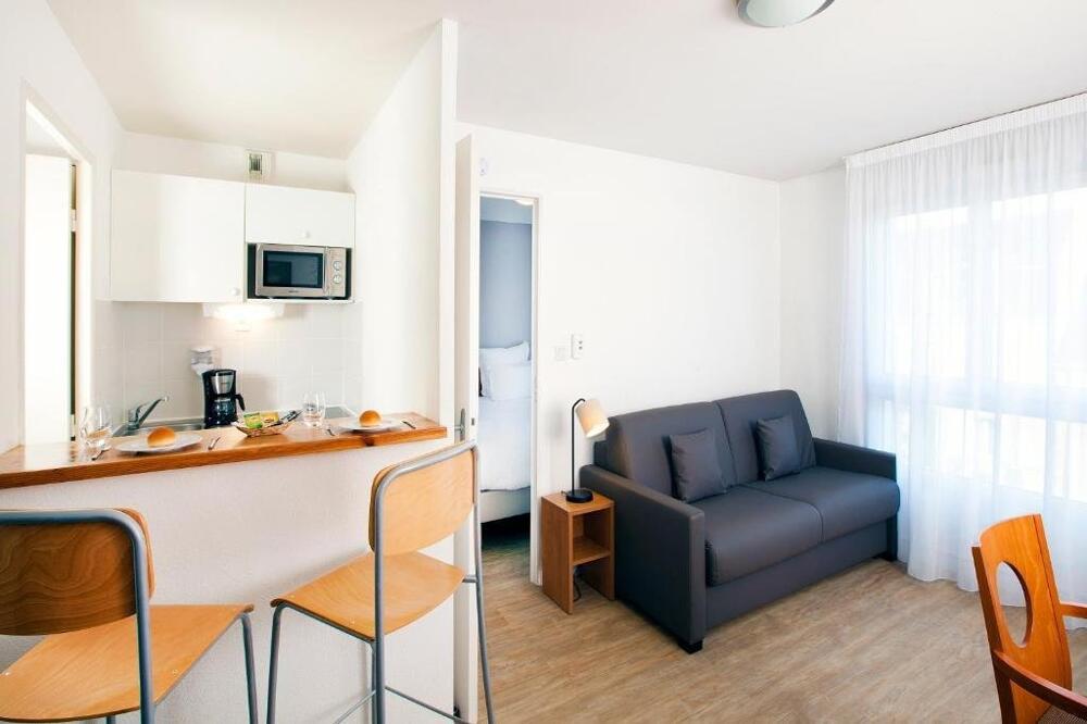Foto de una habitación de Aparthotel Séjours &amp;amp; Affaires Angers Atrium