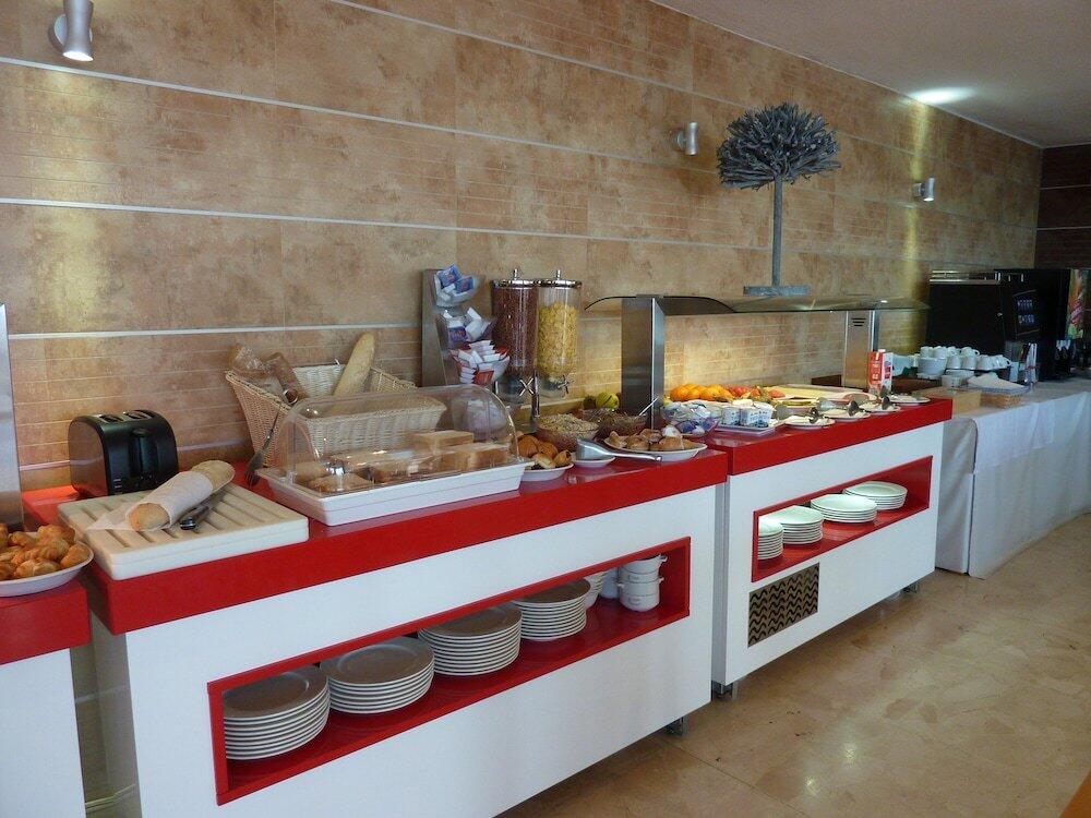 Foto de restauración de Apartamentos Bahia Blanca