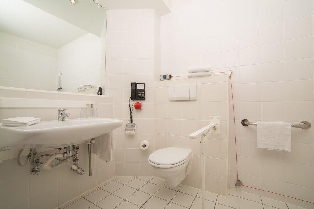 Foto del baño de Holiday Inn Gent Expo, an IHG Hotel