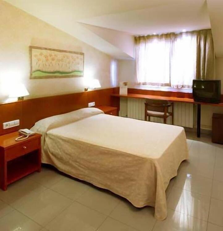 Foto de una habitación de Hotel Urpí