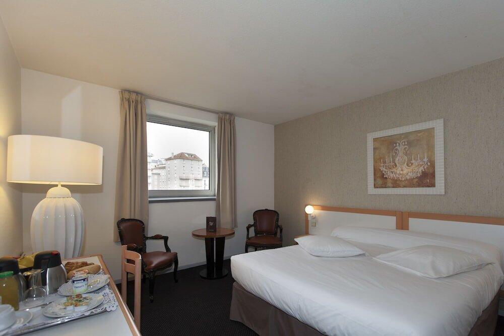 Foto de una habitación de Hôtel Paradis