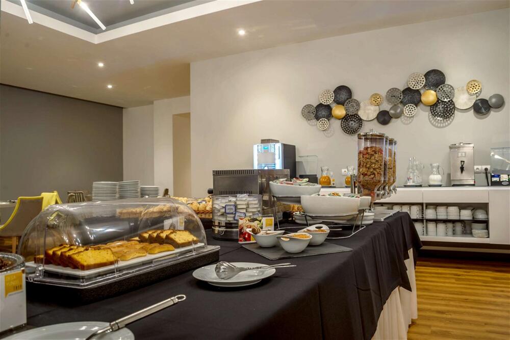 Foto de restauración de Hotel Covilhã Dona Maria Affiliated by Meliá