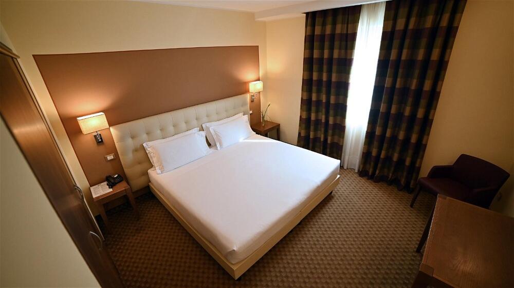 Foto de una habitación de Best Western Grand Hotel Guinigi