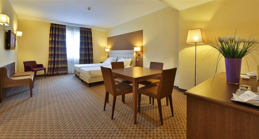 Foto de una habitación de Best Western Grand Hotel Guinigi