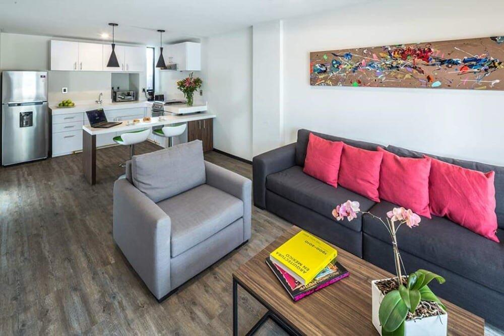 Foto de una habitación de Aparthotel FlowSuites WTC