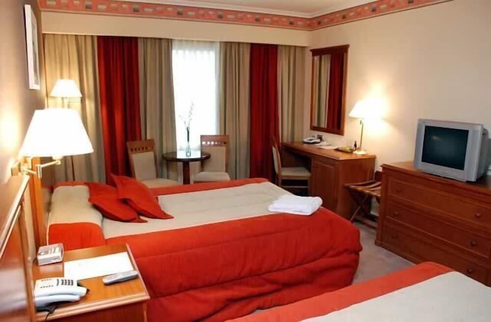 Foto de una habitación de Howard Johnson Villa María Hotel y Casino