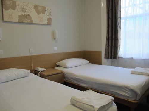 Foto de una habitación de Lords Hotel