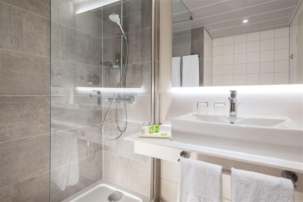 Foto del baño de Hotel NH Luxembourg
