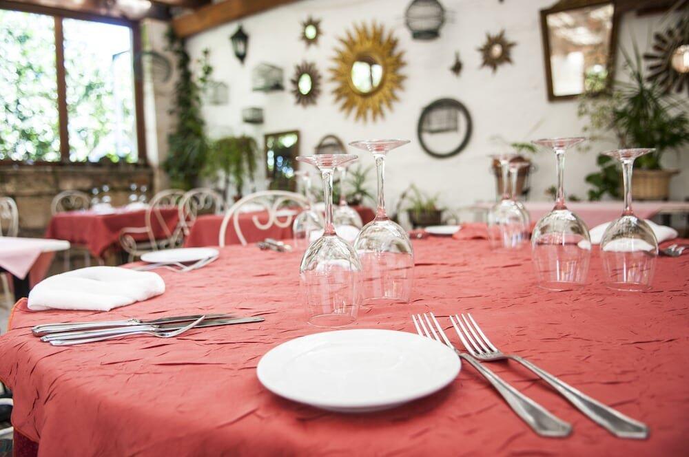 Foto de restauración de Hotel Rural Biniarroca - Adults Only