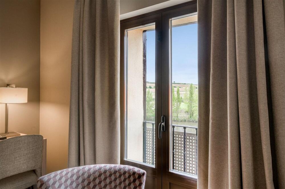 Foto de una habitación de Hotel Palacio Tondón