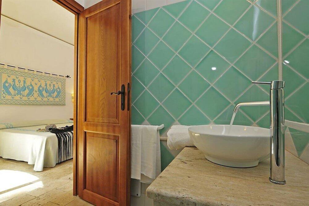 Foto de una habitación de Hotel Arbatax Park Resort - Telis